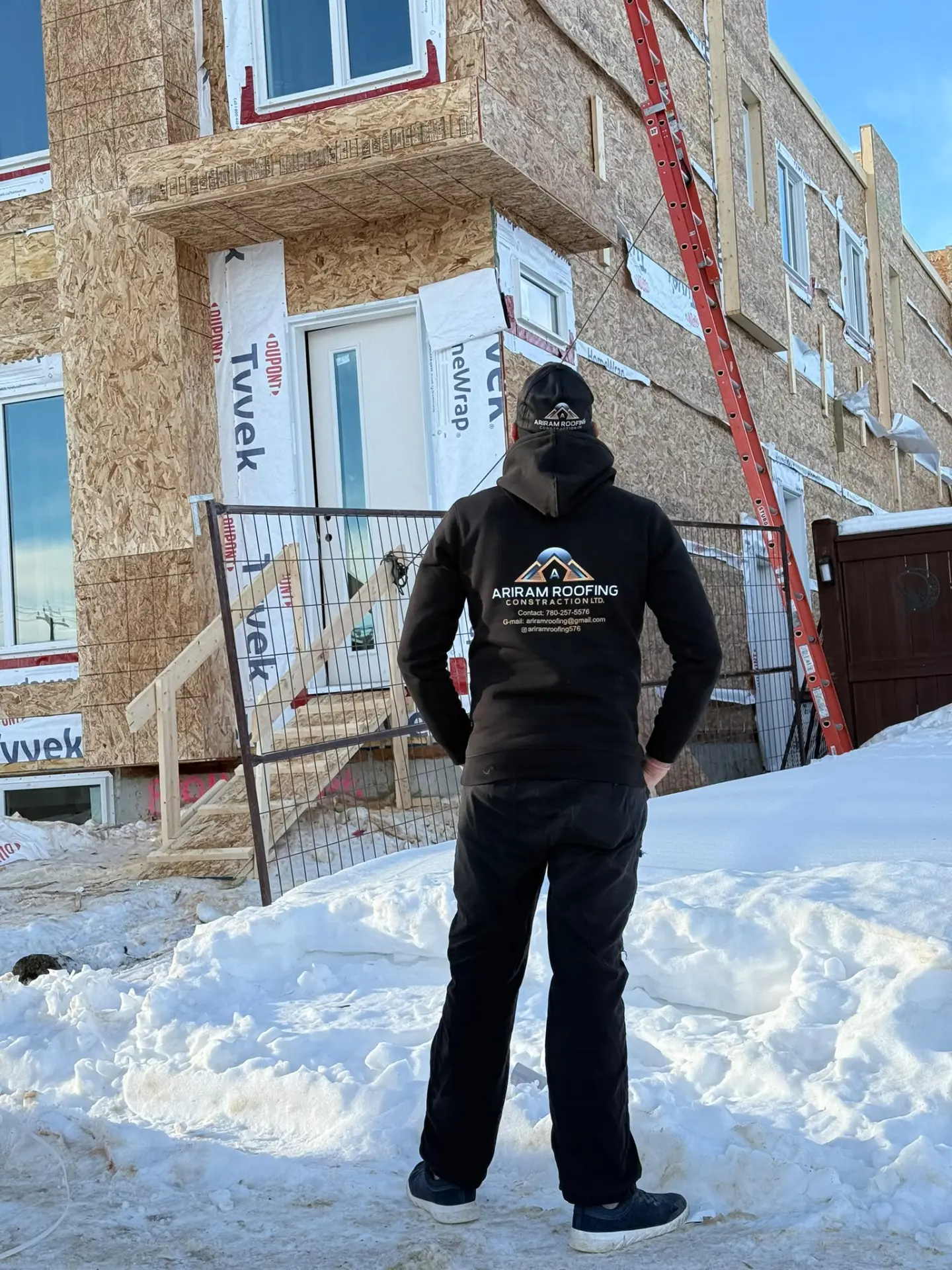 Ariram Roofing team member on site at a new construction build